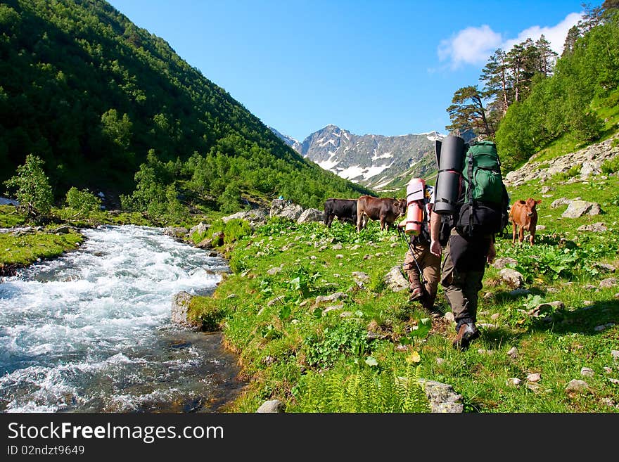 Hiker boys in Caucasus mountains