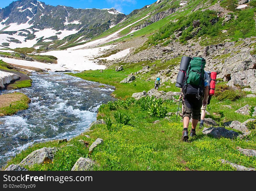 Hiker boys in Caucasus mountains