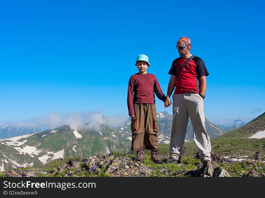 Hiker boys in Caucasus mountains