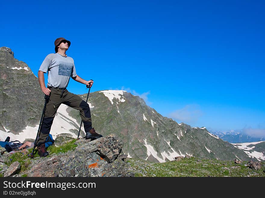 Hiker boy in Caucasus mountains