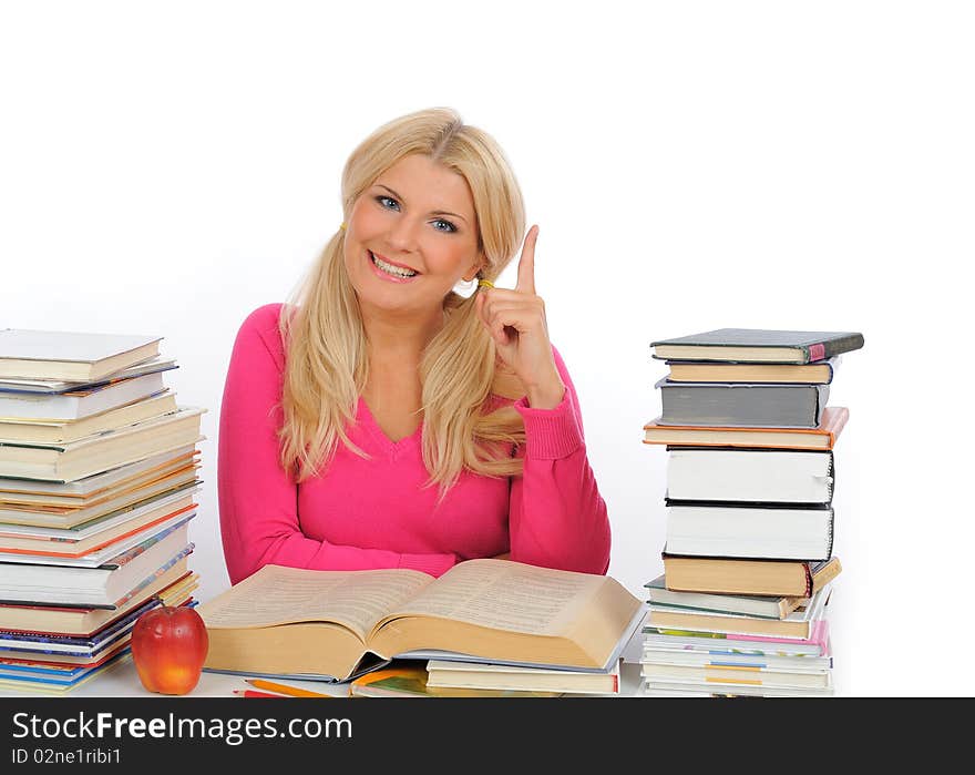 Portrait of young student girl with lots of books studing for exams. isolated on white background