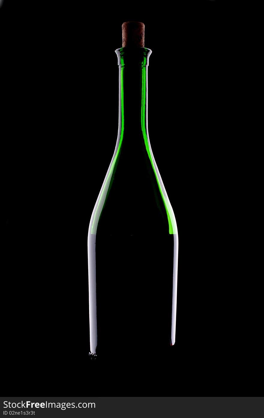 Green glacc bottle of wine and wineglass on black background