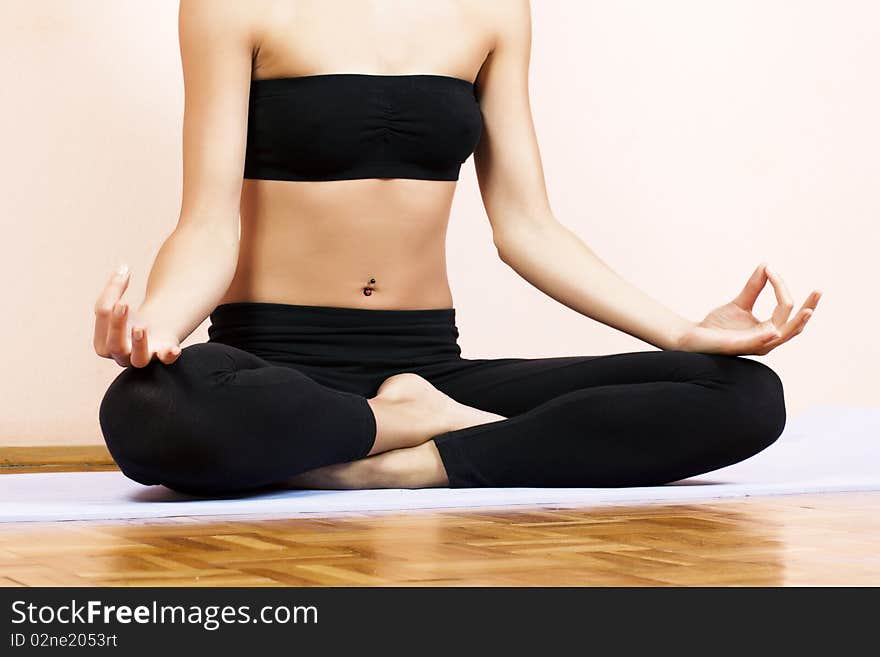 Closeup of woman hands in yoga meditation pose.