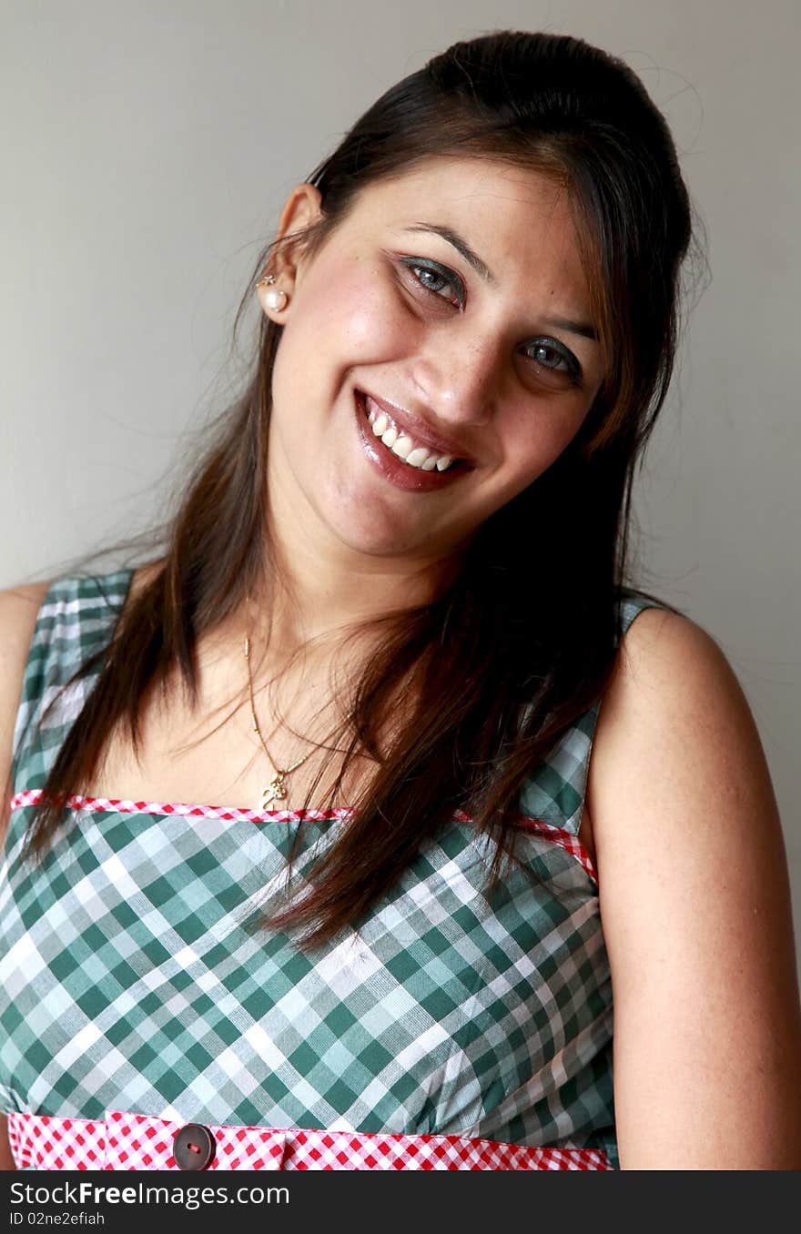 Portrait shot of sweet smiling indian girl. Portrait shot of sweet smiling indian girl.