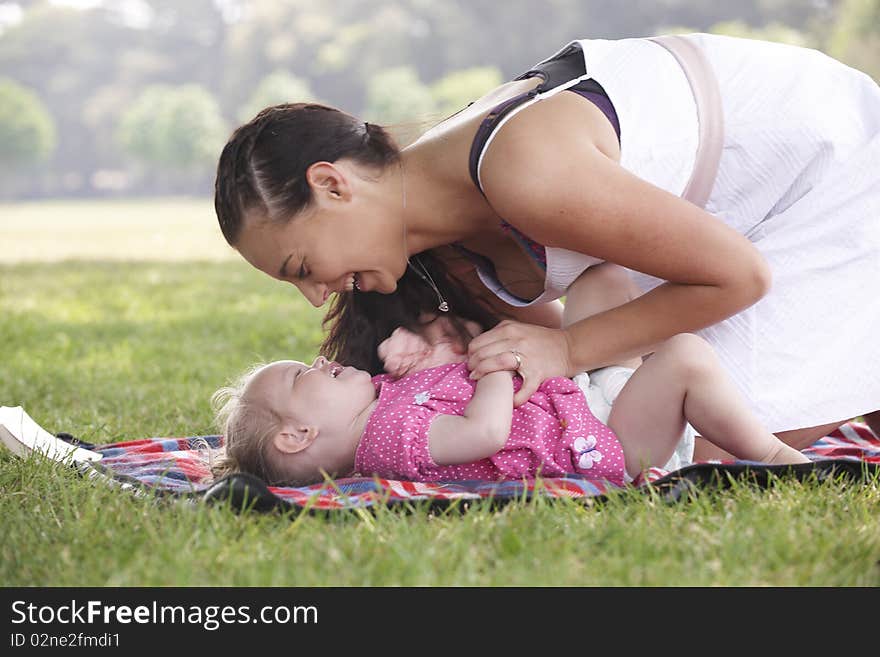 Mother playing with daughter