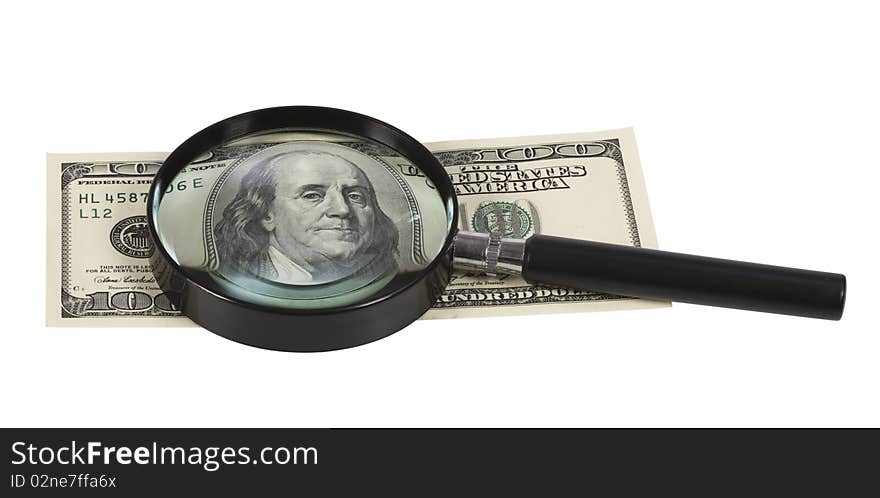 Closeup of $100 banknote through the magnifier,isolated on white with clipping path.