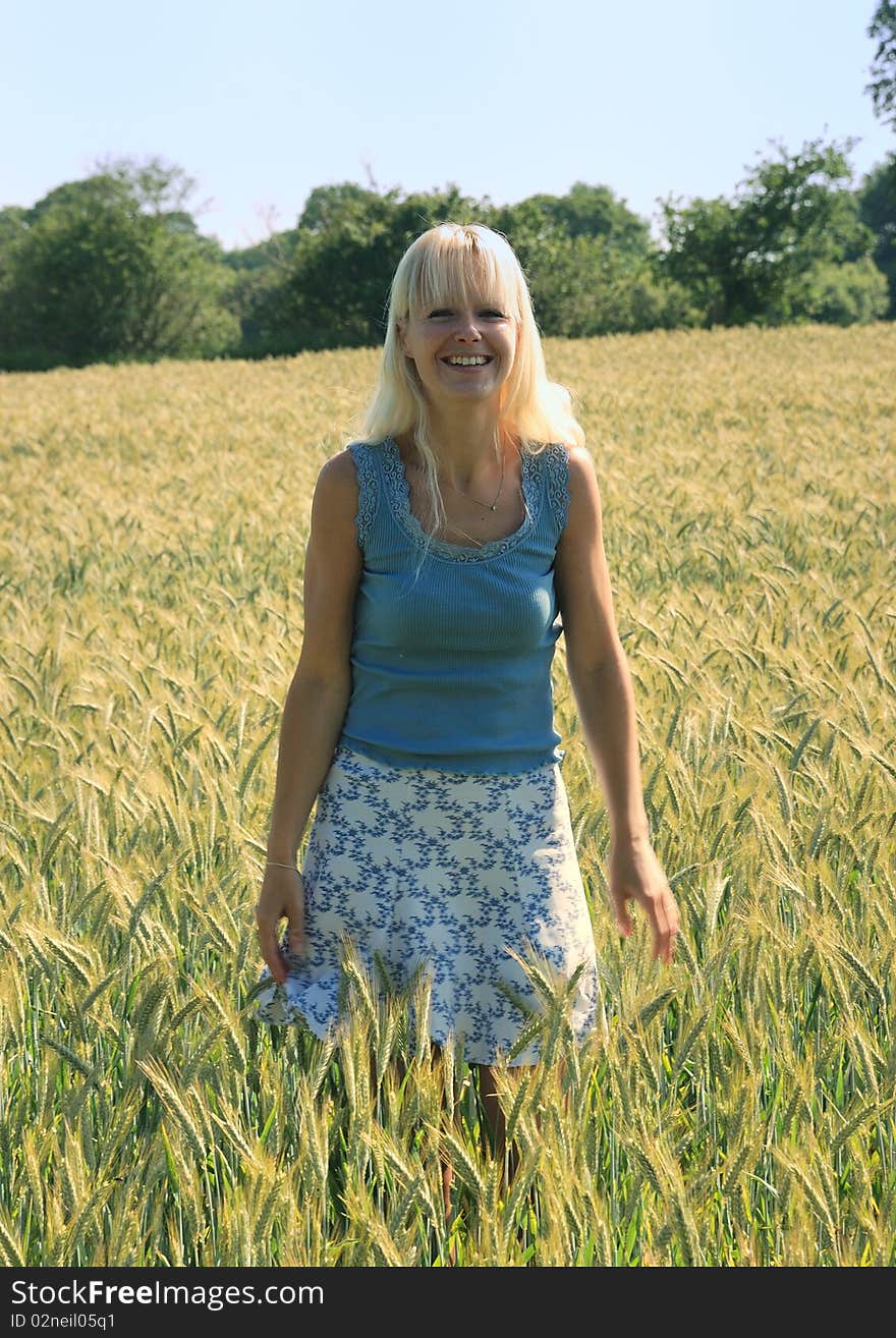 Blond woman in field