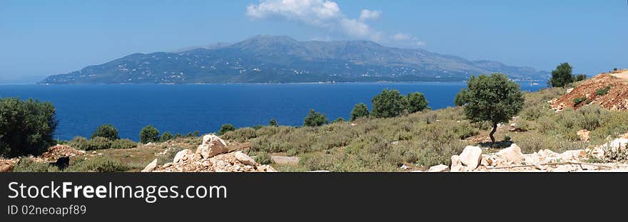 Greek island Corfu seen from Albanian coast near the city of Ksamil. Greek island Corfu seen from Albanian coast near the city of Ksamil