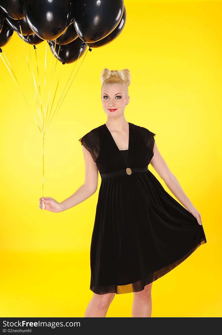 lady with black balloons