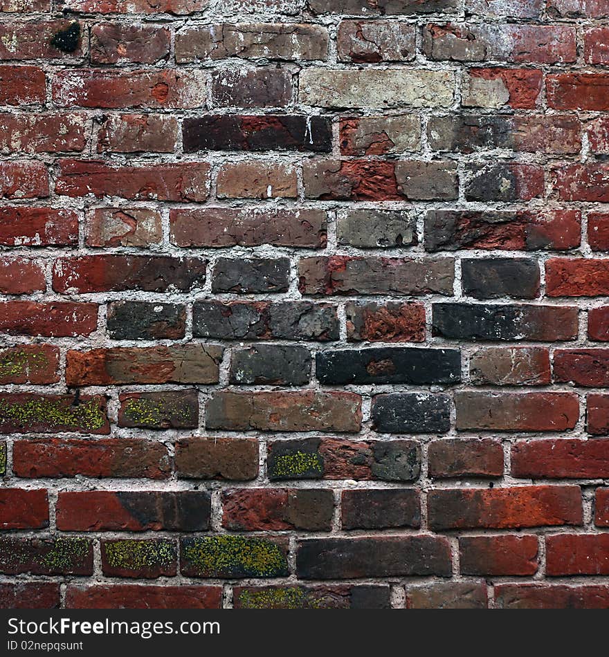 Aging brick wall. grunge background.