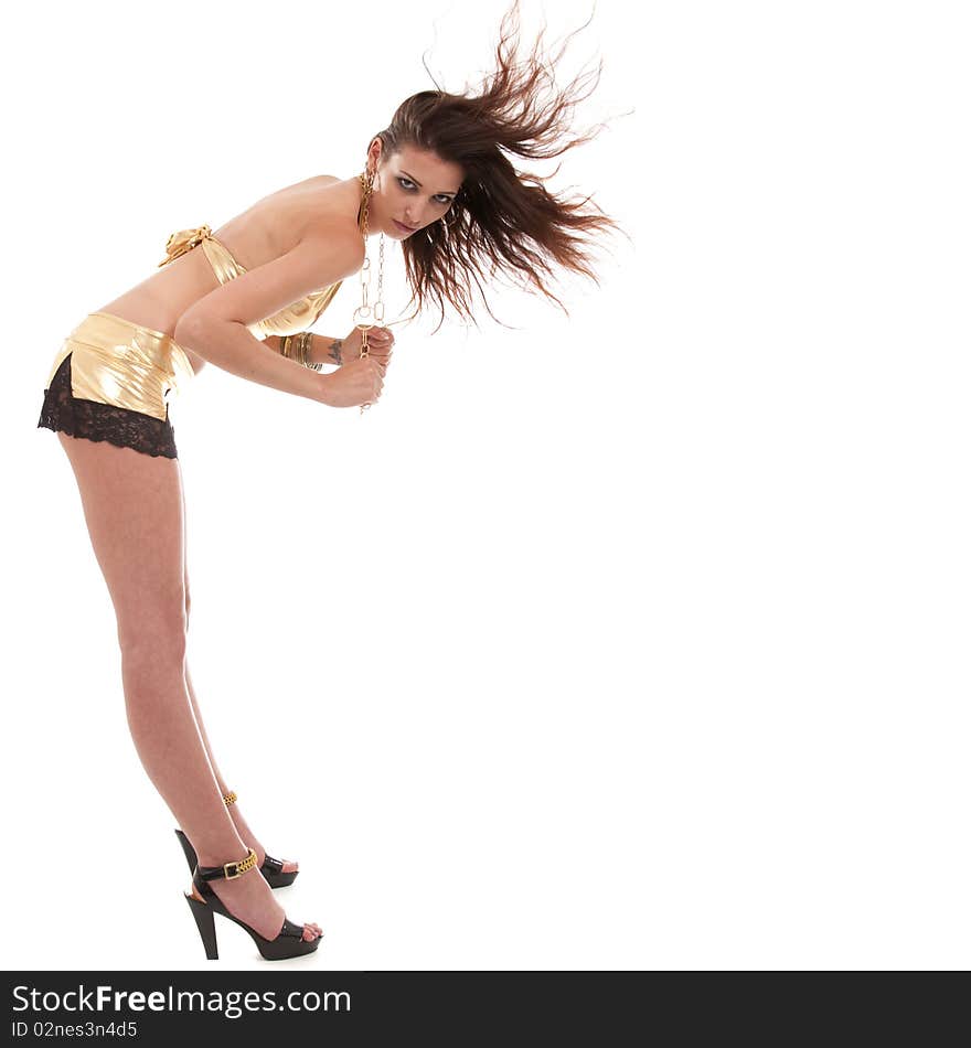 Young woman with golden bikini. With flying hair - very fresh summer shot. Young woman with golden bikini. With flying hair - very fresh summer shot.