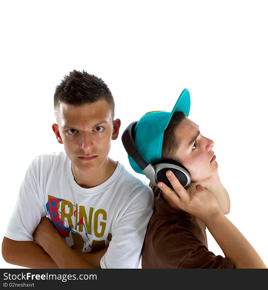 Two young fresh teenagers acting as djs at a party scene. Isolated over white. Two young fresh teenagers acting as djs at a party scene. Isolated over white.