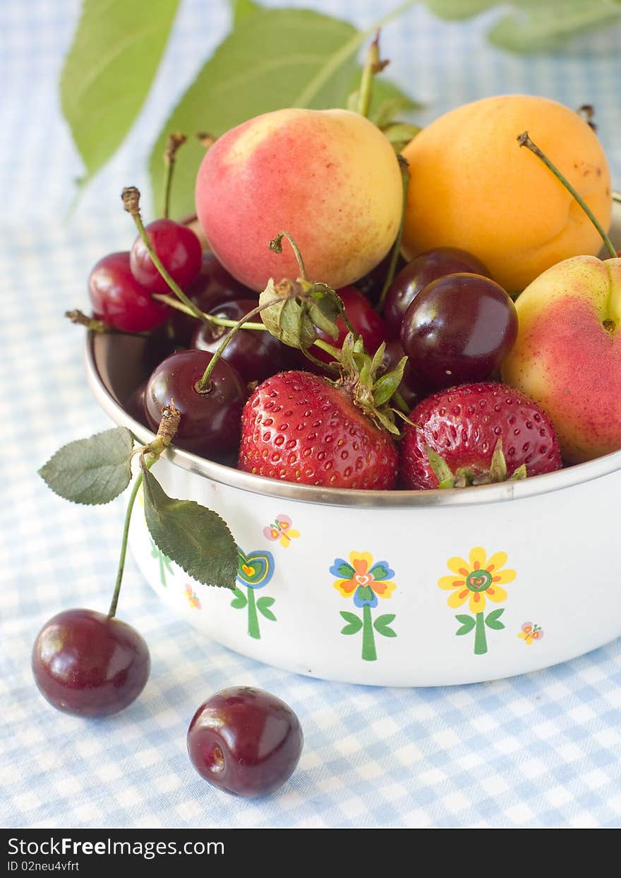 Fresh apricots, cherry and strawberry in bowl. Fresh apricots, cherry and strawberry in bowl