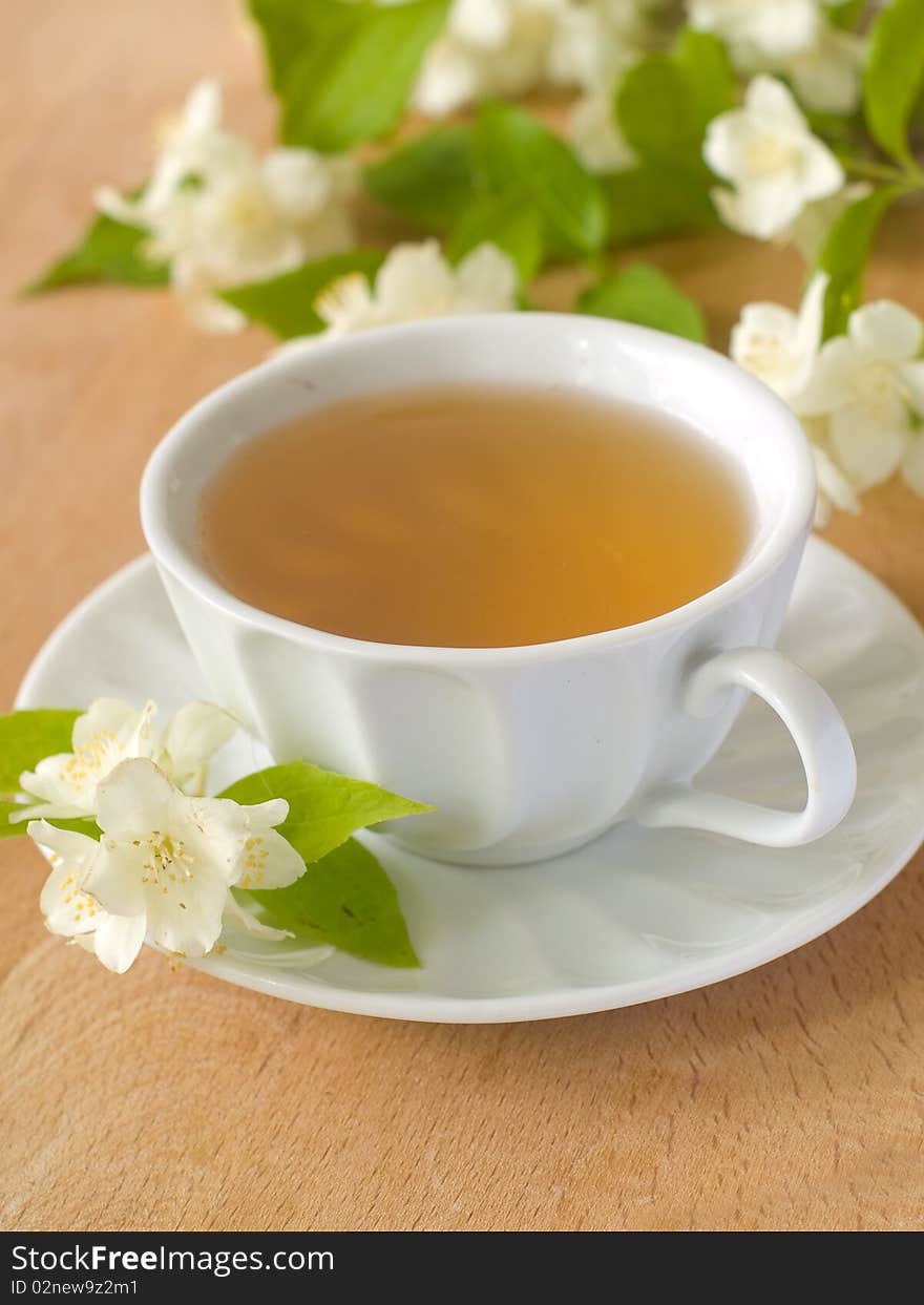 Organic jasmine tea with fresh jasmine flowers. Organic jasmine tea with fresh jasmine flowers.