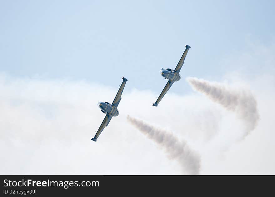 A photograph of a pair of airplanes.