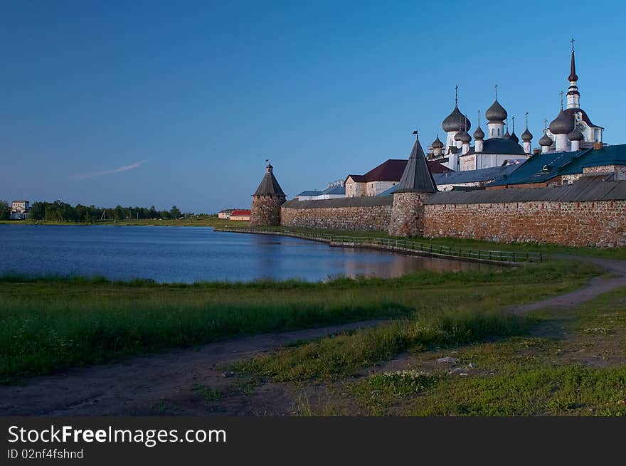 Old round stone tower in Solovetsky monastery with blue sky background, Karelia, Russian Federation. Old round stone tower in Solovetsky monastery with blue sky background, Karelia, Russian Federation.