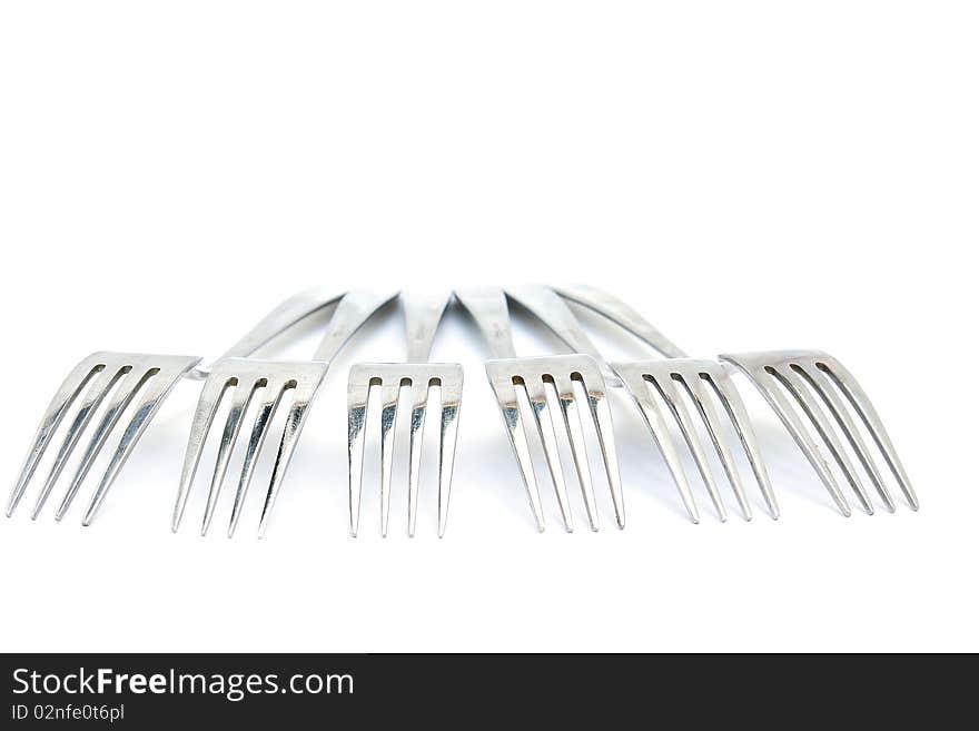 Group of Forks from the aged metal. Isolated on white