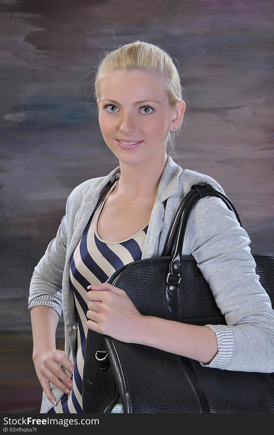 Young woman 20-25 years with road bag