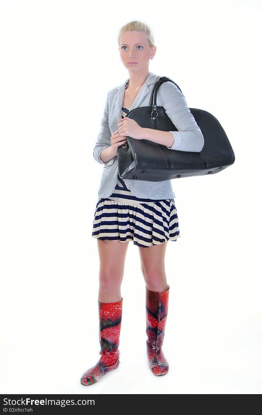 Young adult woman with road bag