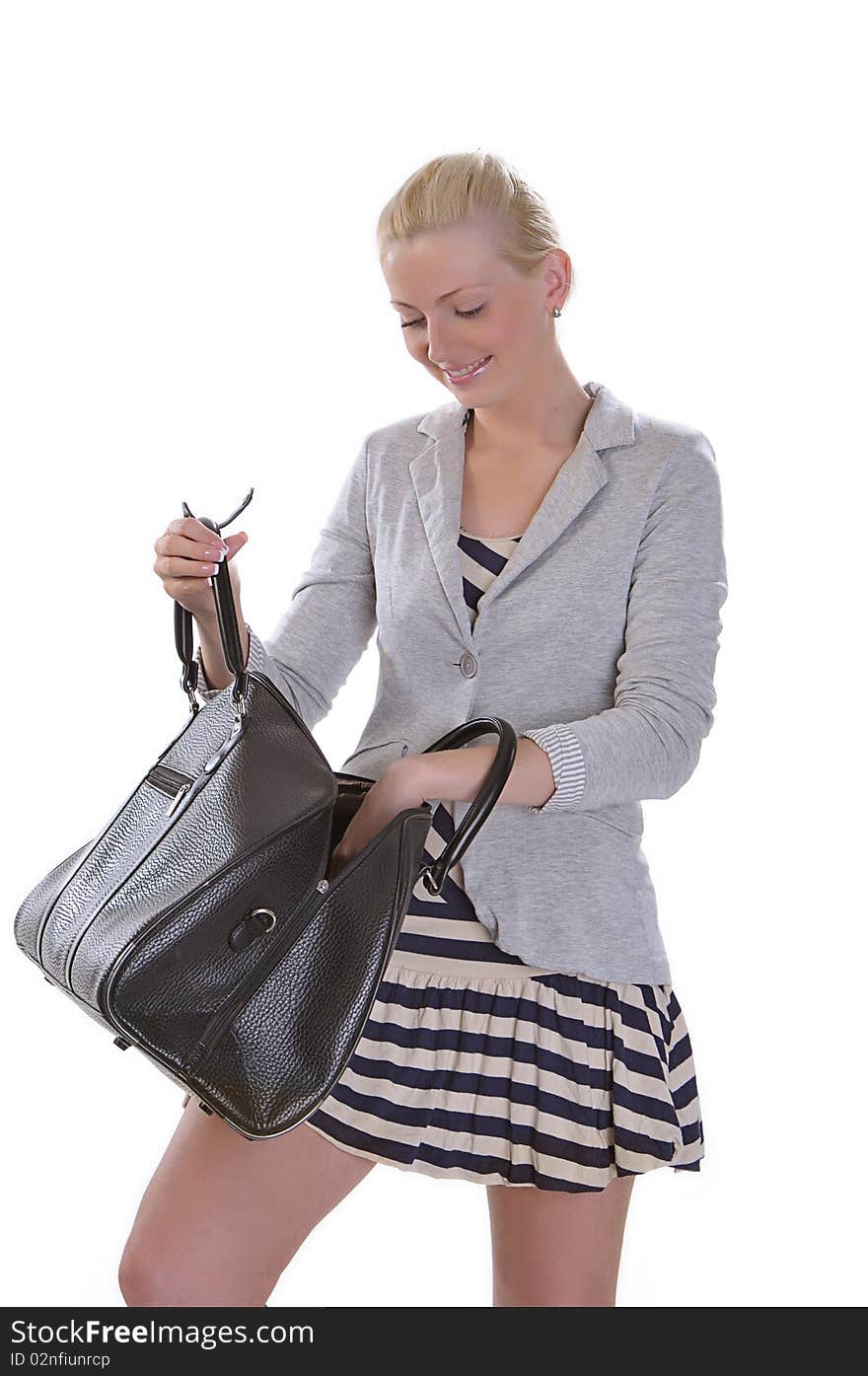 Young woman with opened large bag