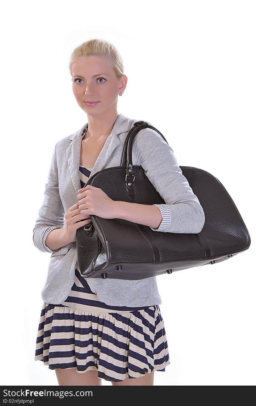 Young adult woman with road bag