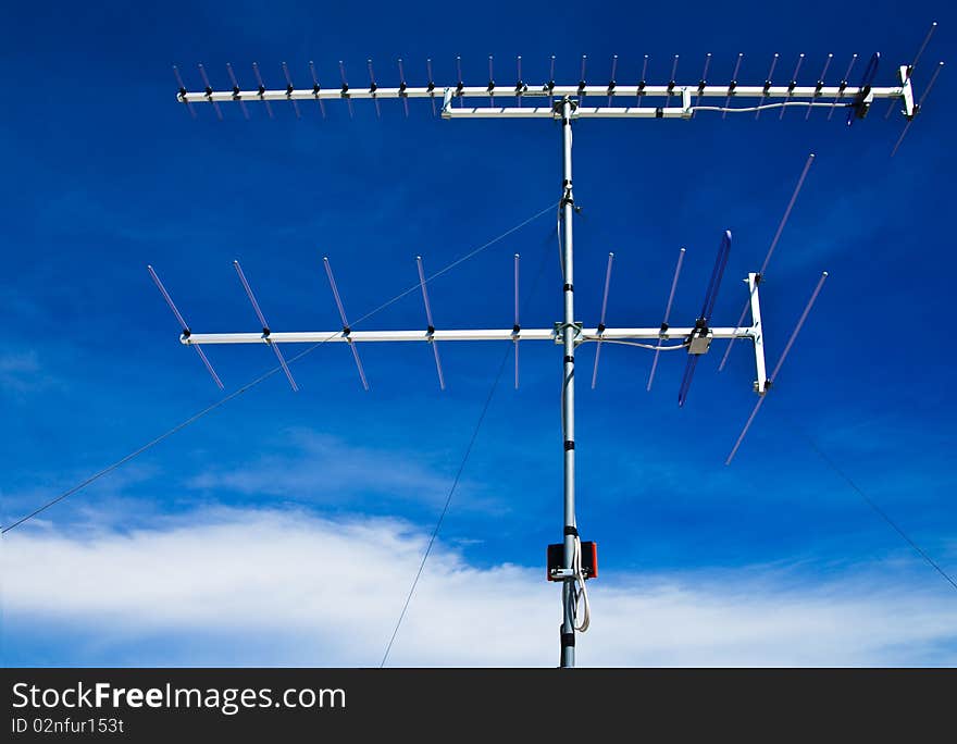 Television antenna and blue sky. Television antenna and blue sky