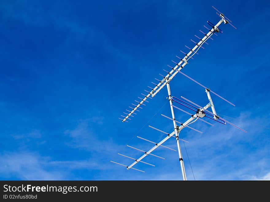 Television antenna and blue sky. Television antenna and blue sky