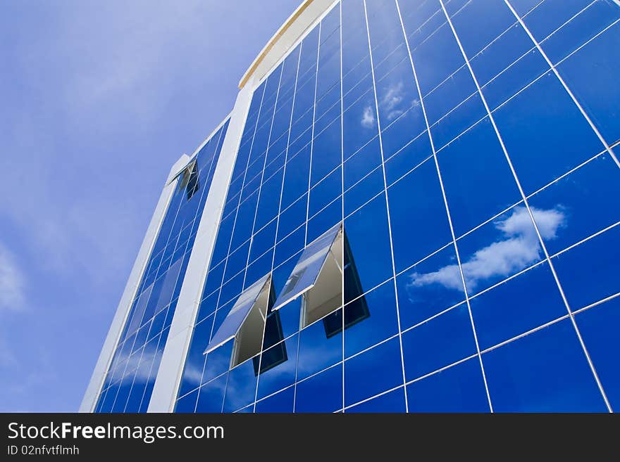 Glass building and sky reflection. Glass building and sky reflection