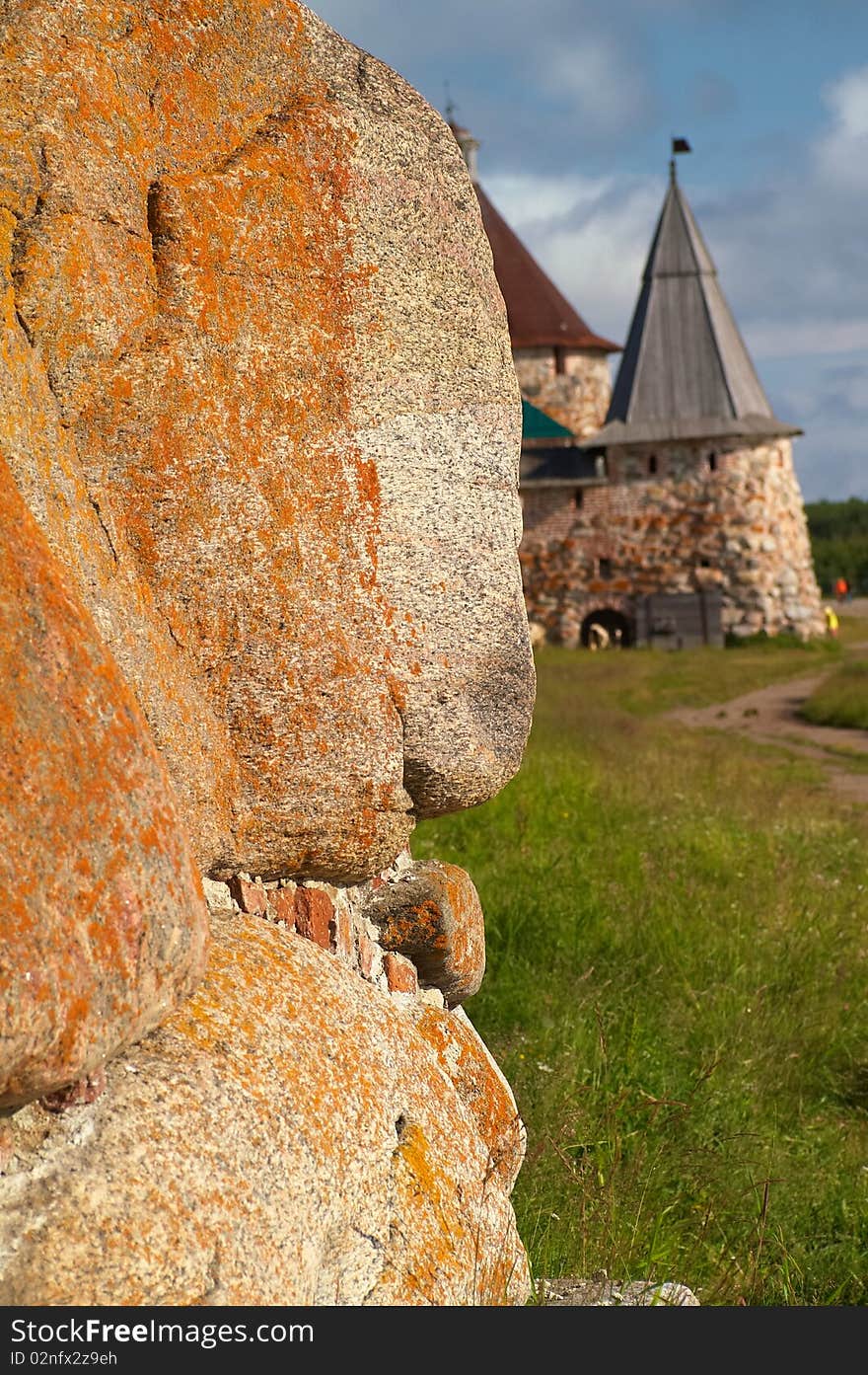 Old round stone tower in Solovetsky monastery with blue sky background, Karelia, Russian Federation. Old round stone tower in Solovetsky monastery with blue sky background, Karelia, Russian Federation.