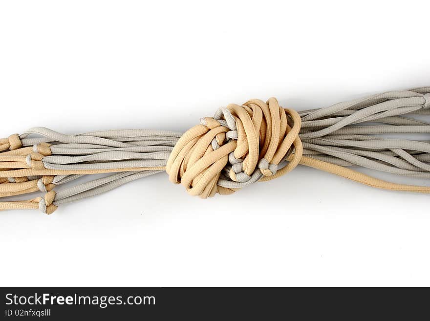 Rope with knot close up. Isolated on white background.