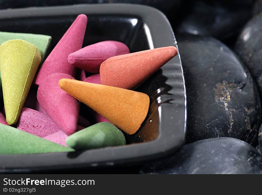 Bowl of spa scented on pebbles