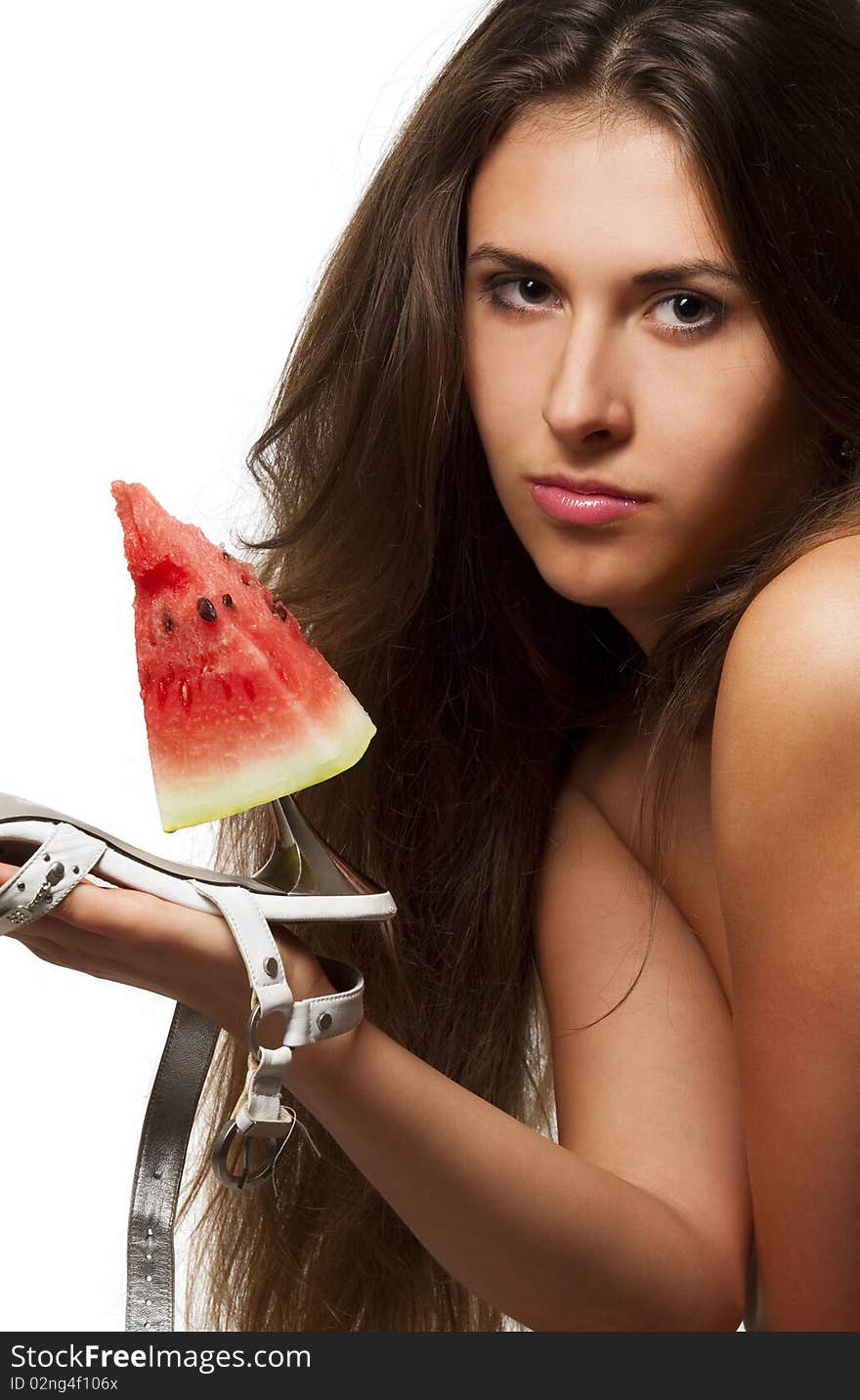 Prittty woman with slice of watermelon on high heel. Prittty woman with slice of watermelon on high heel