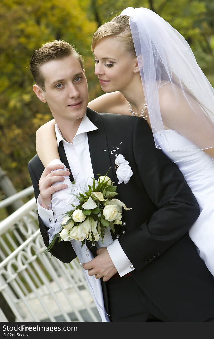 Colorful wedding shot of happy  bride and groom