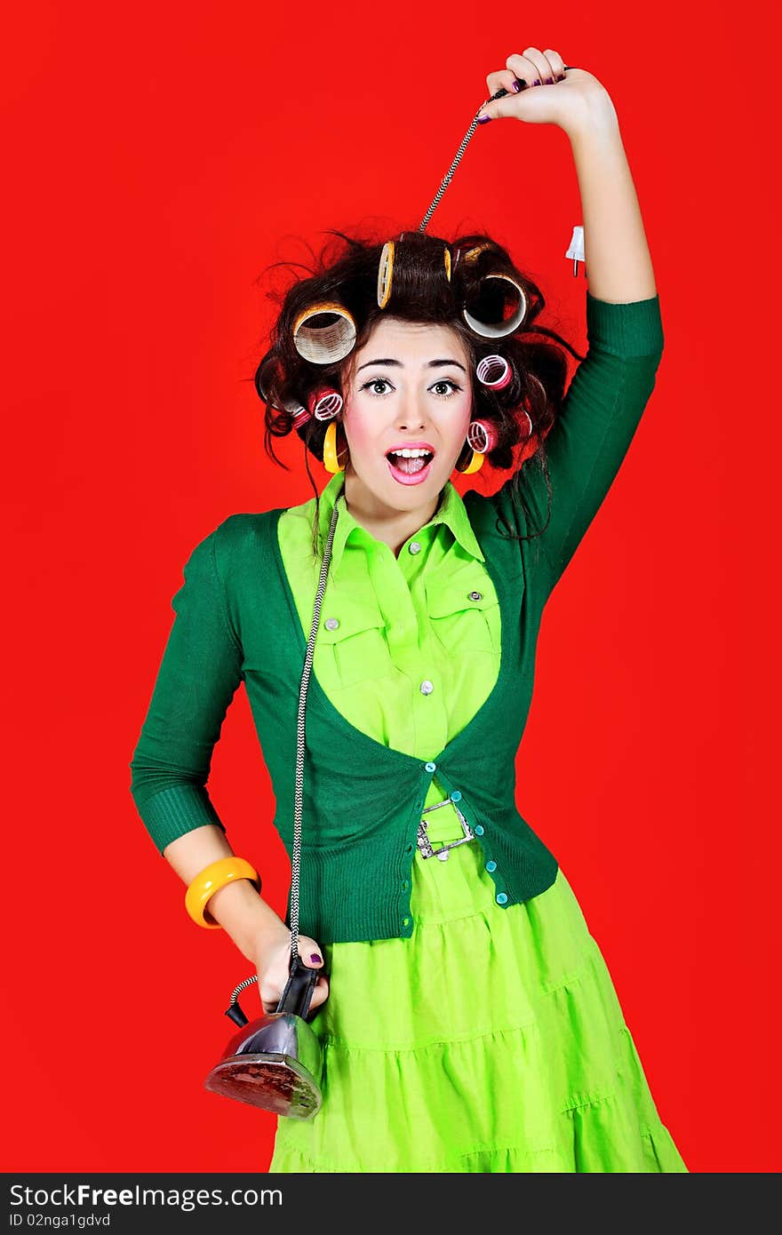 Shot of a funny  woman housewife dressed in retro style. Shot of a funny  woman housewife dressed in retro style.