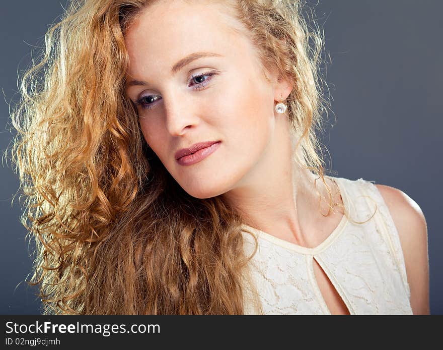 Portrait of beautiful lady on blue