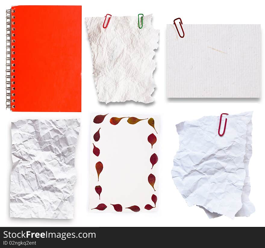 Various notes and notebook isolated on white background with clips. Various notes and notebook isolated on white background with clips