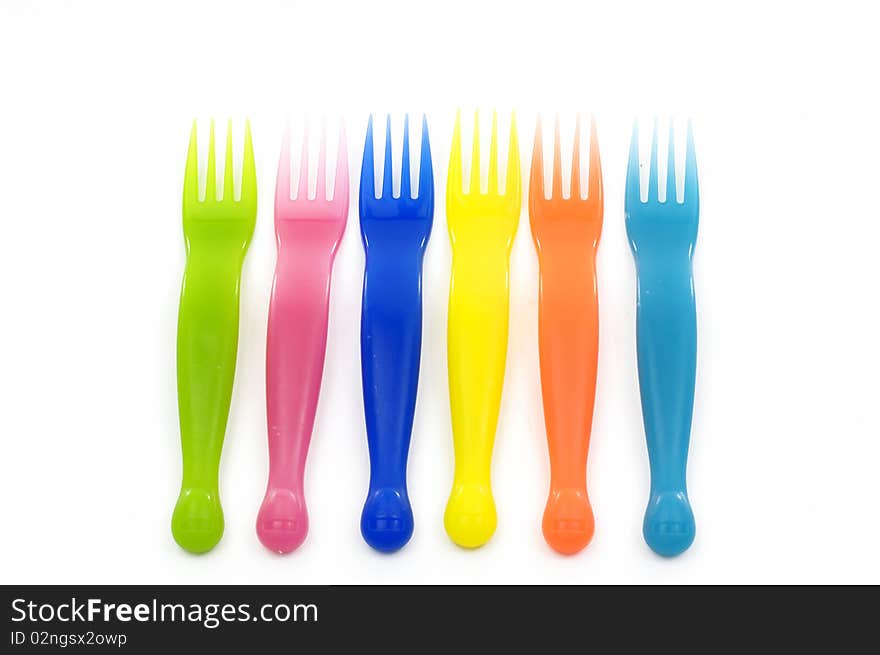 Row of Colorful plastic forks