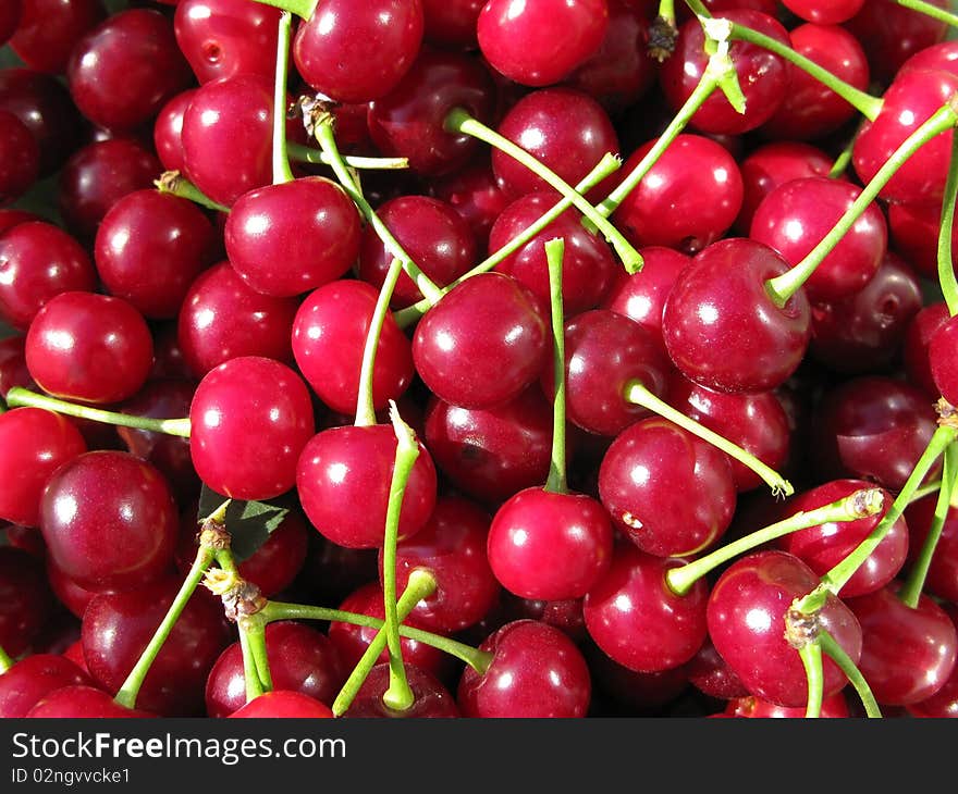 Close up wonderful red cherries background