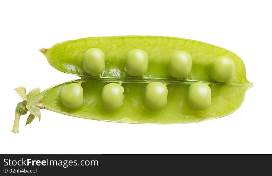 Peas balls in the shell isolated on white