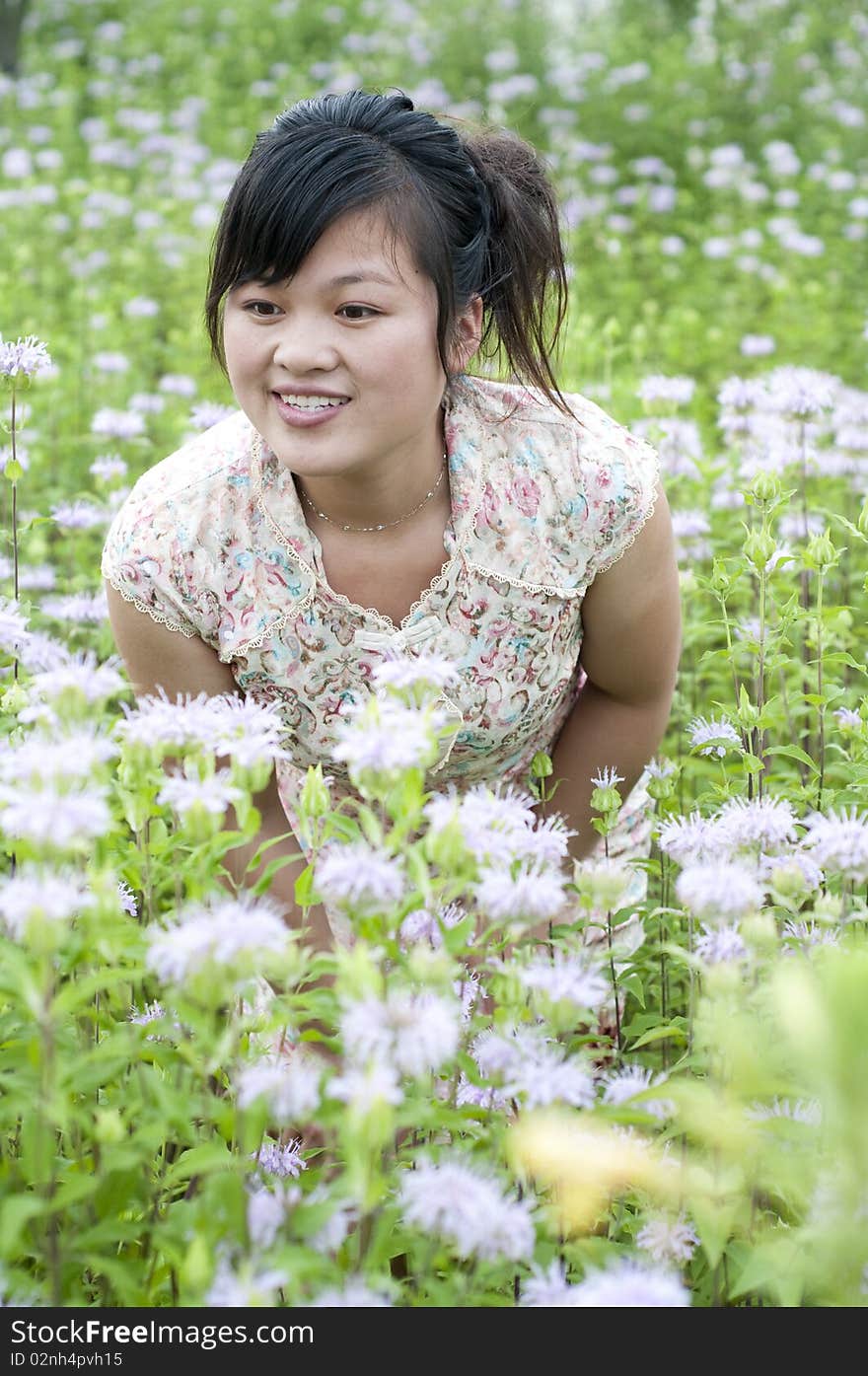 A Chinese women in the aromatous garden