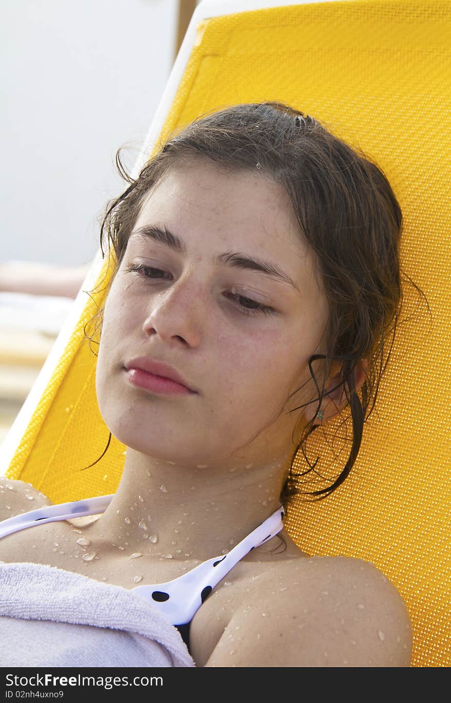 Portrait of girl with her face wet