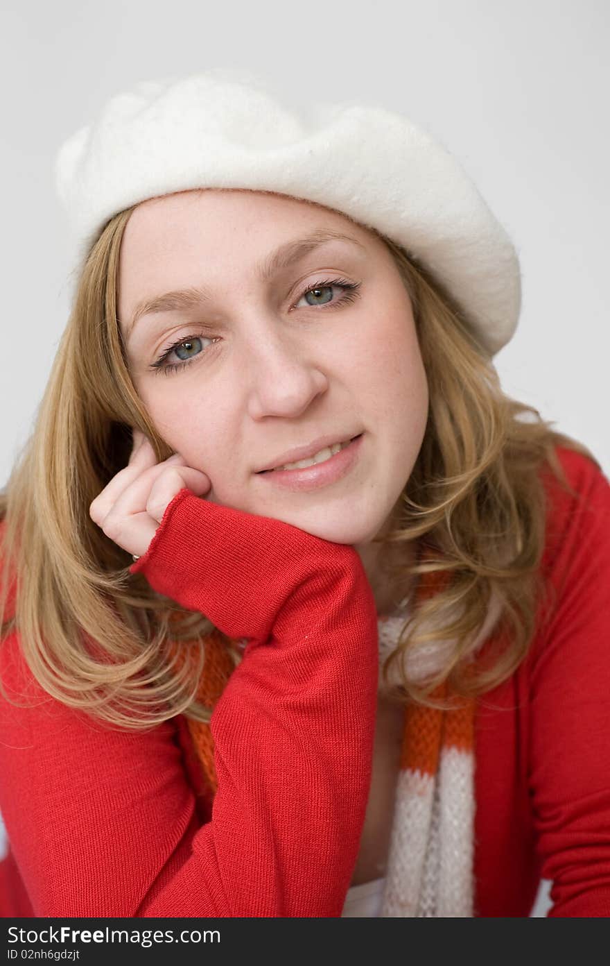 Young woman in white beret