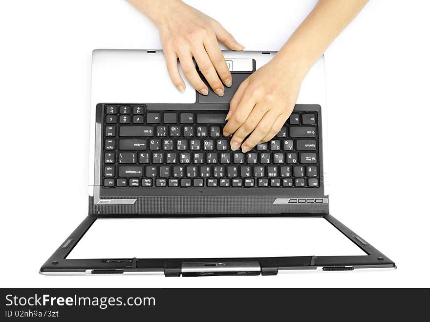 Two female hands on the laptop isolated on white background