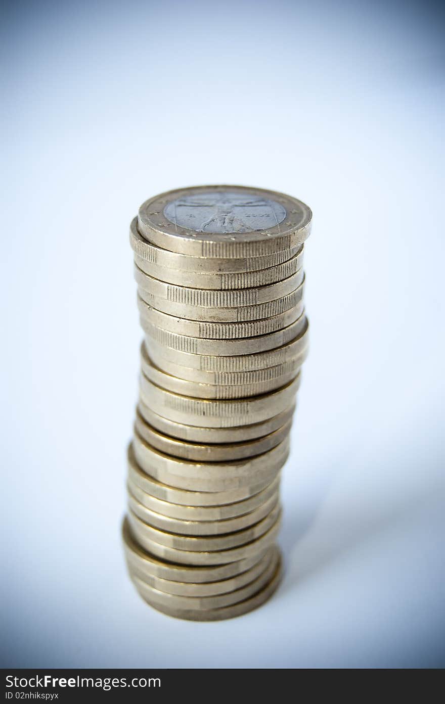 Many coins isolated on white backgrounds