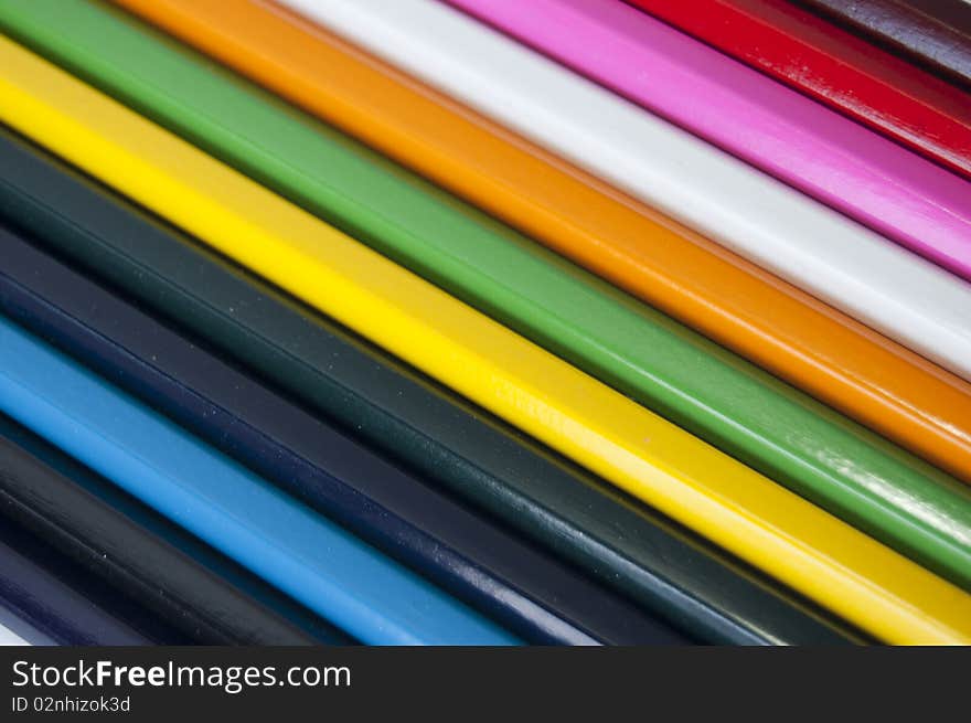 Close up of many colored pencils isolated