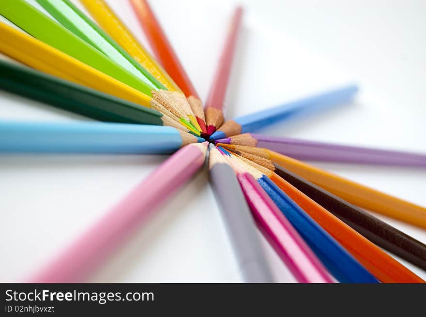 Close up of many colored pencils isolated