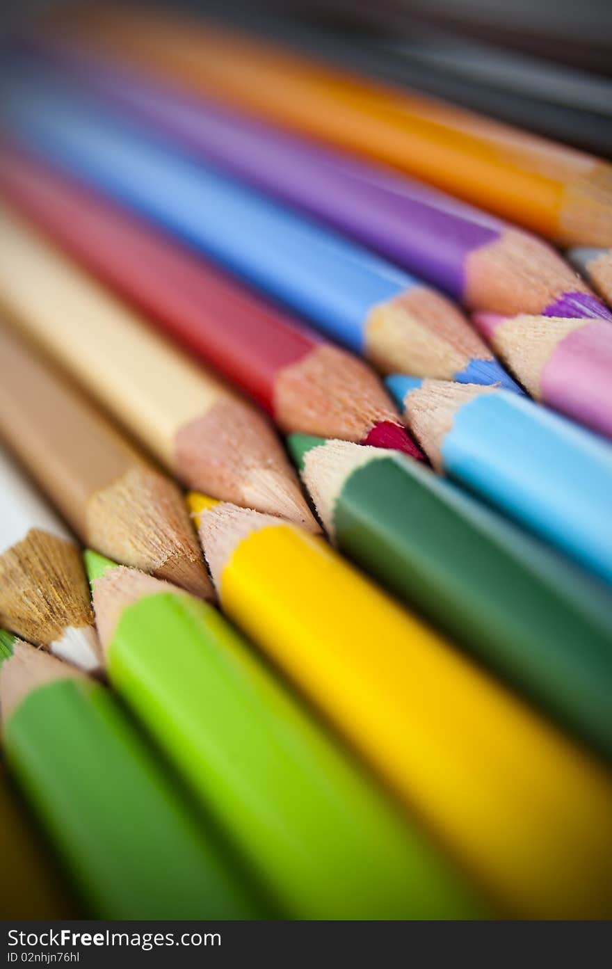 Close up of many colored pencils isolated