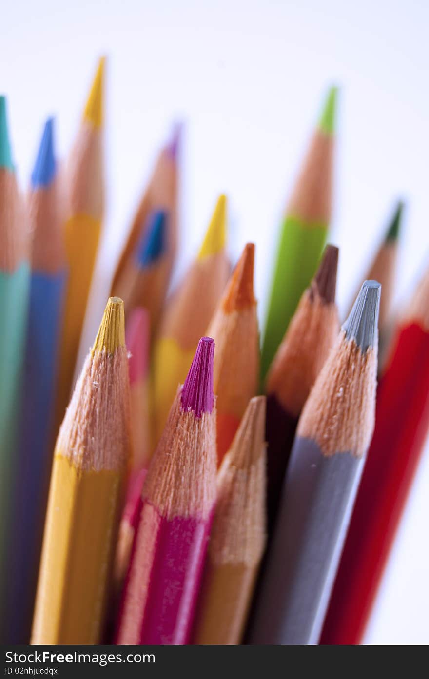 Close up of many colored pencils isolated