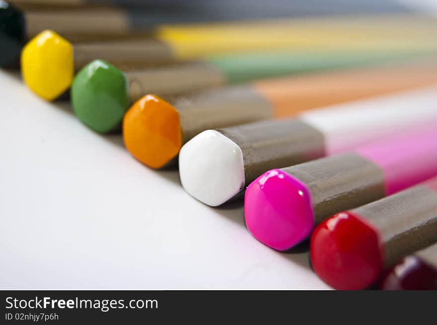 Close up of many colored pencils isolated