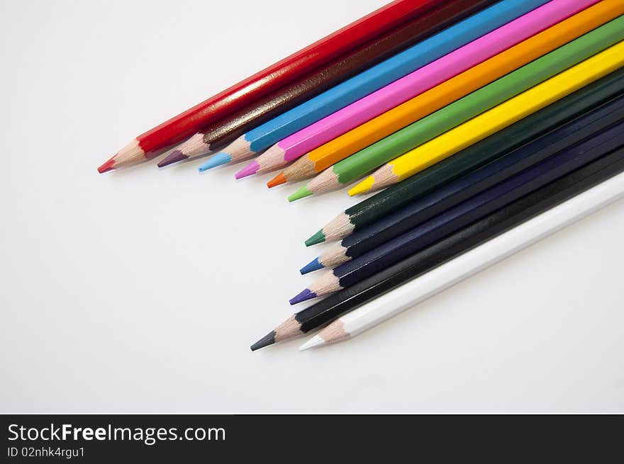 Close up of many colored pencils isolated